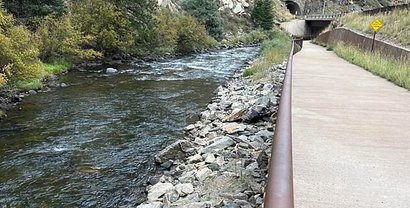 The paved Clear Creek Trail running beside the creek in Golden